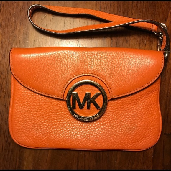 Michael Kors Handbags - Michael Kors Wristlet in Orange